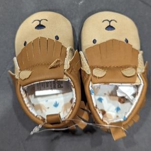 Boy or Girl moccasins 0-3mons, light brown with a little face